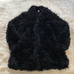 black faux fur coat